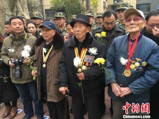 南京大屠杀死难者国家公祭日：17处丛葬地举行悼念活动