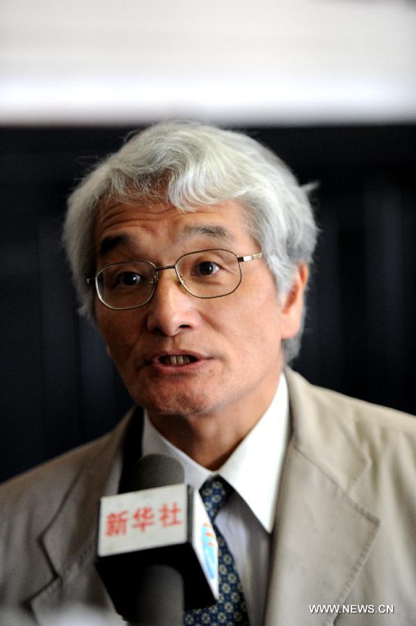 Norio Minami, a Japanese lawyer, is interviewed by Xinhua during a hearing event for victims of Japanese abandoned chemical weapons in Harbin, capital of northeast China's Heilongjiang Province, April 29, 2014.