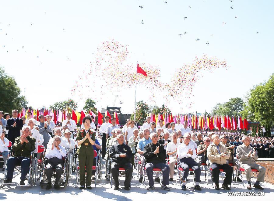 Veterans attend a ceremony to mark the 69th anniversary of the Victory Day in the Anti-Japanese War at the Museum of the War of the Chinese People's Resistance Against Japanese Aggression in Beijing, capital of China, Sept. 3, 2014.