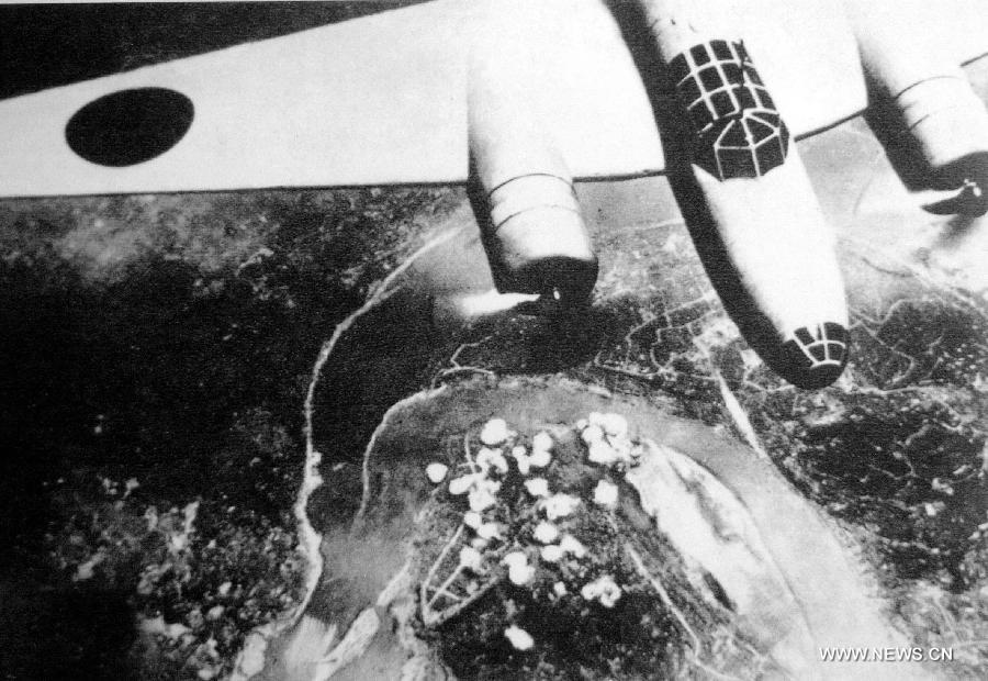 File photo copy shows Japanese air service carrying out air-strikes to southwest China's Chongqing, June 16, 1940. 