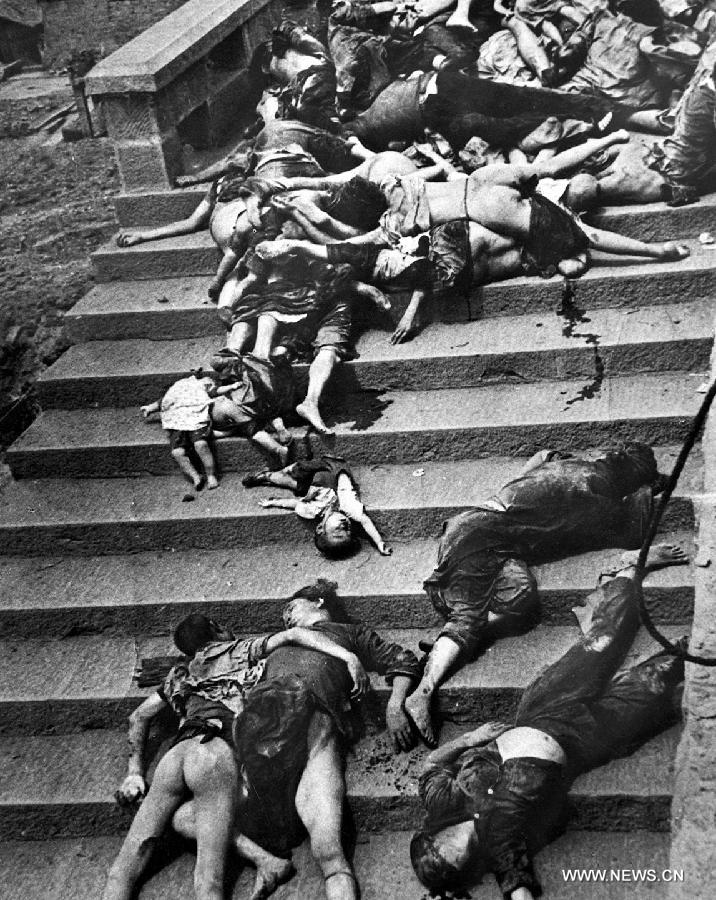 File photo shows civilians dying of asphyxia while seeking shelter in a dugout from air-strikes carried out by Japanese army in southwest China's Chongqing, June 28, 1940.