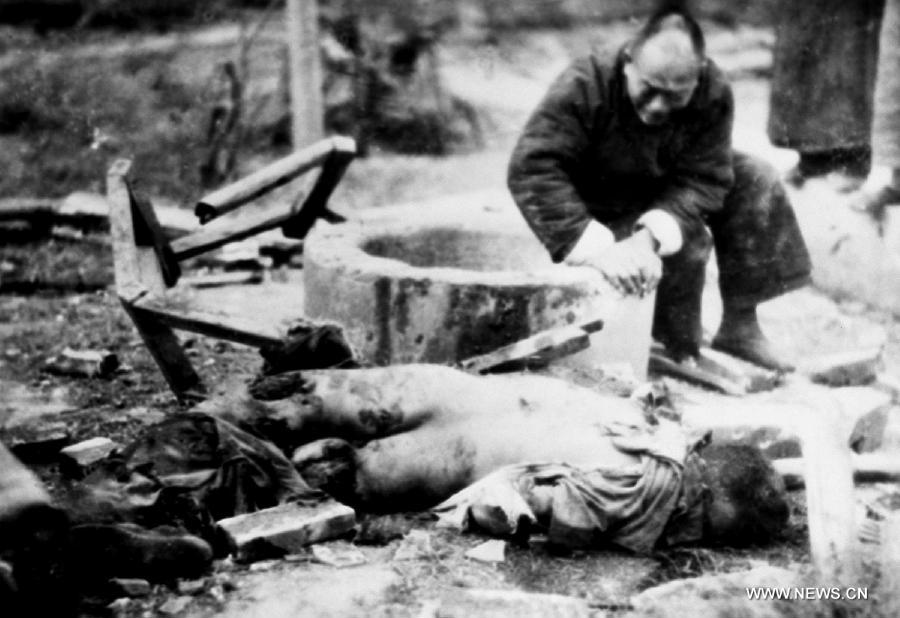 File photo shows a civilian killed by the air-strike carried out by Japanese army at a hospital in Nanchang, east China's Jiangxi Province, Dec. 9, 1937.