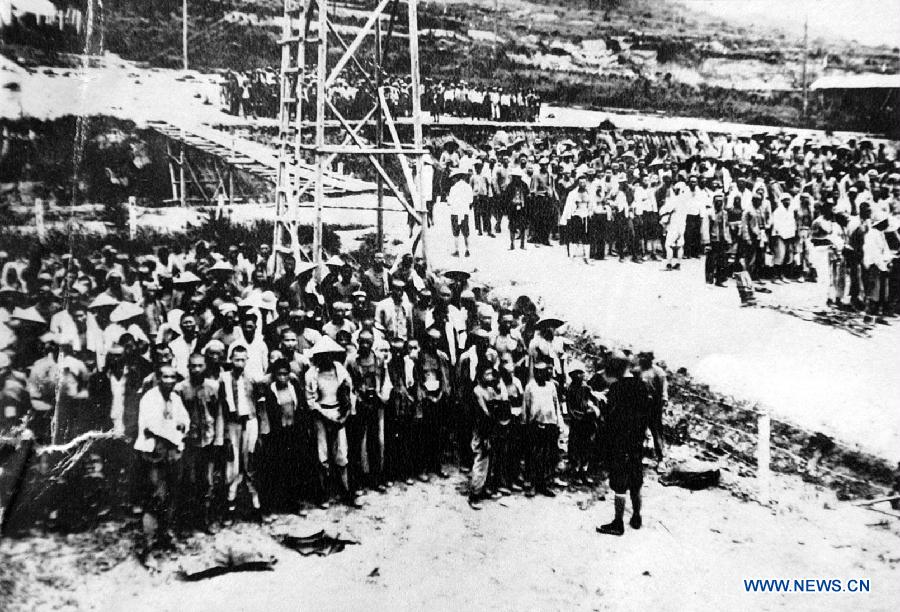 File photo copy shows the rollcall of Chinese forced labors working for Japan to build the Fengman hydropower station in Jilin of northeast China after the region was illegally occupied by Japanese invaders in 1931. Japan invaded northeast China in 1931 and conducted a full-scale invasion in 1937. By the end of World War II, millions of Chinese forced laborers had been enslaved by Japanese invaders to toil under harsh conditions at mines and factories in northeast China and Japan. Those laborers were under close watch and suffered inhumane treatment. Many of them died from malnutrition, illness, physical abuse and plain murder. (Xinhua) 