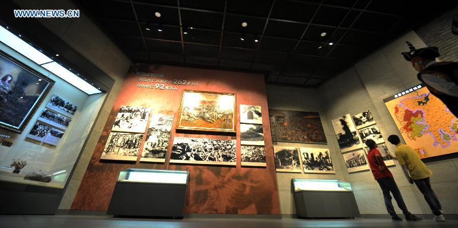 People visit the Hunan Anti-Japanese War Museum in Zhijiang, central China's Hunan Province, Aug. 21, 2015. 