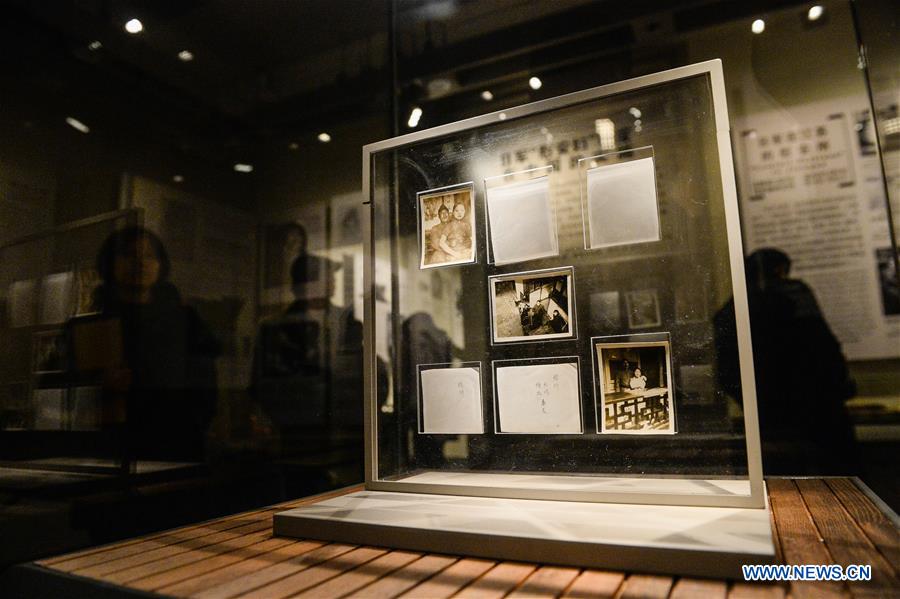 Old photos are displayed in the memorial for 'comfort women' in Nanjing, east China's Jiangsu Province, Dec. 1, 2015.