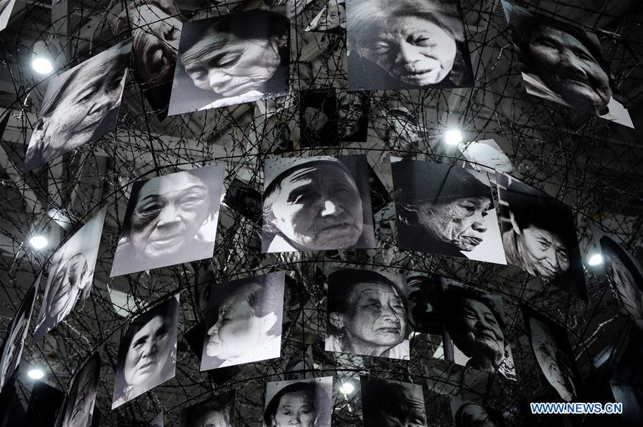 Portraits of victims are hung in the memorial for 'comfort women' in Nanjing, east China's Jiangsu Province, Dec. 1, 2015. 