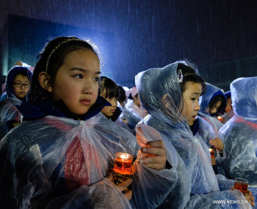 Photo taken on Dec. 13, 2016 shows the scene of a candlelight vigil for China's National Memorial Day for Nanjing Massacre Victims at the memorial hall for the massacre victims in Nanjing, east China's Jiangsu Province. (Xinhua/Sun Can)