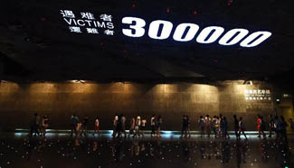 People visit Nanjing Massacre memorial to remember victims